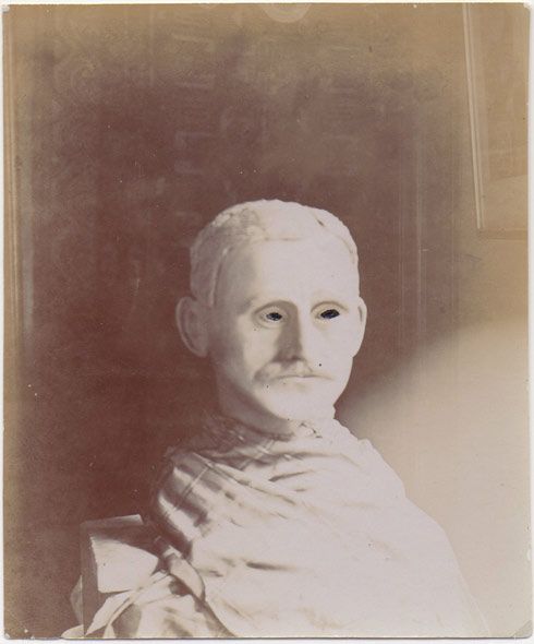 Extraordinary defaced albumen man or statue with pen marks over eyes