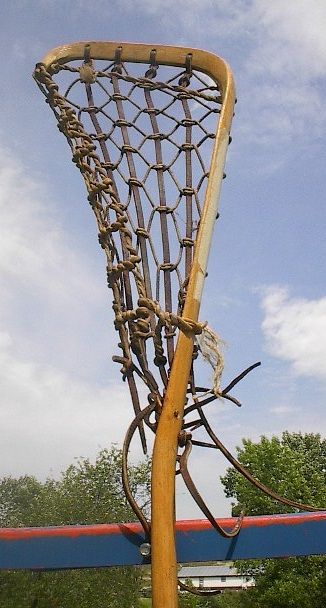 lacrosse stick. Measures 47 long by 9 wide. The lacrosse stick